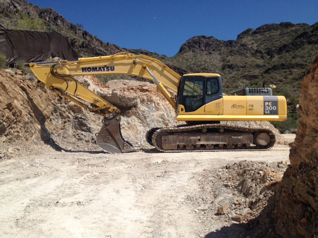Large grading equipment is onsite building the home site pad.