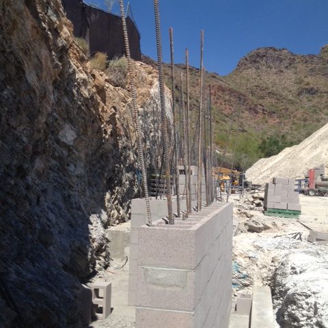 First tier of rear retaining walls are complete. They will be built in four-foot vertical lifts.