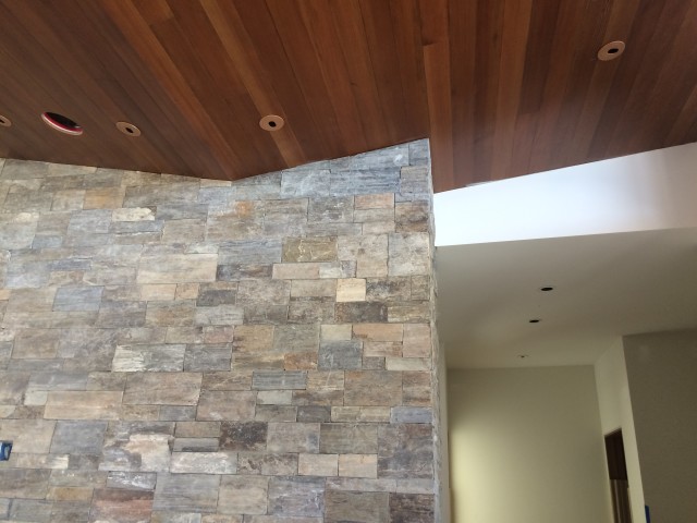 Stone, wood and painted textures complement each other in this contemporary home.