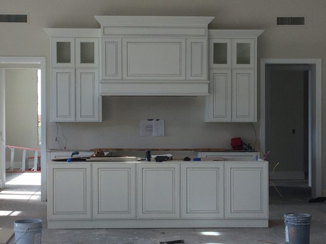 Beautiful cabinetry in the Kitchen is ready for finishing details and appliances.